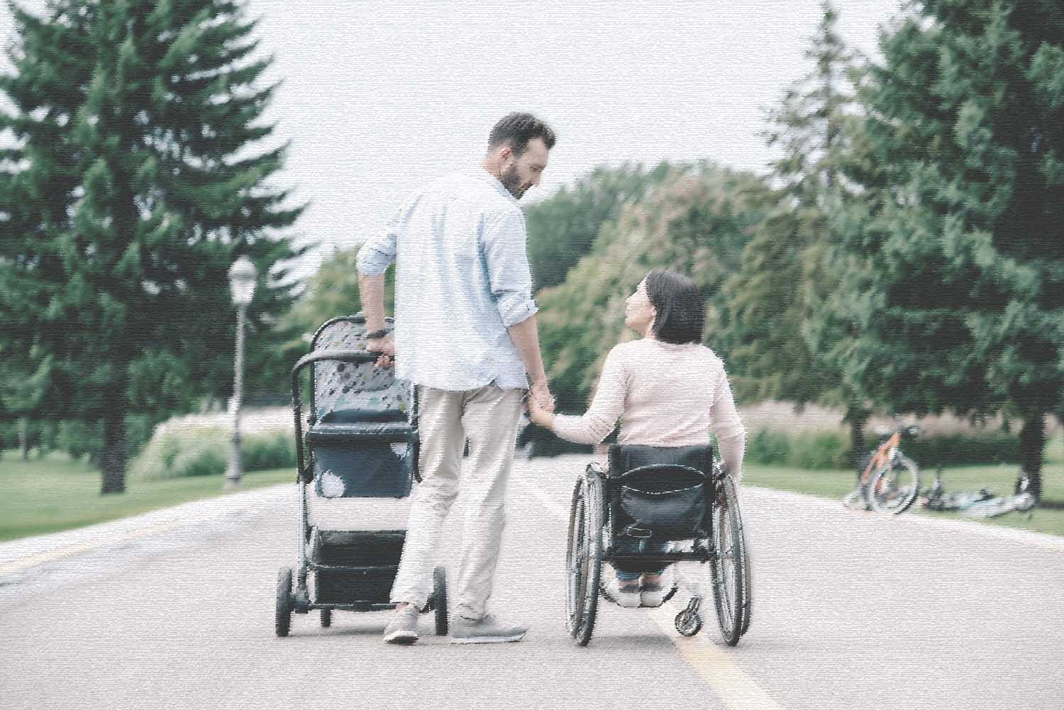 Familienbild mit Mutter im Rollstuhl